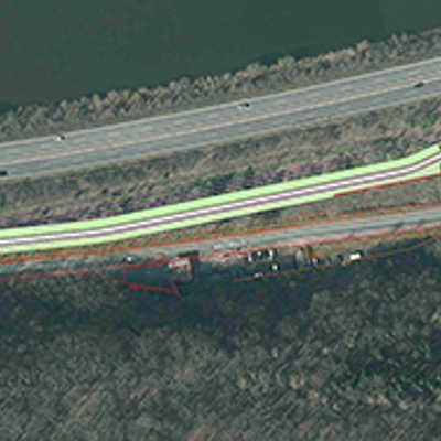 In dem Luftbild ist der geplante neue Rad- und Gehweg mit Grünstreifen entlang der Ruwerer Straße eingezeichnet. Für die sichere Verknüpfung mit dem Radweg am Grüneberg (links) ist der Bau einer Verkehrsinsel geplant .Abbildung: Tiefbauamt